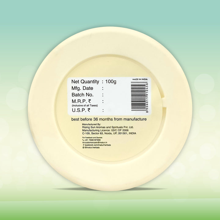 back image of inatur tea tree face pack with a label on a light green background