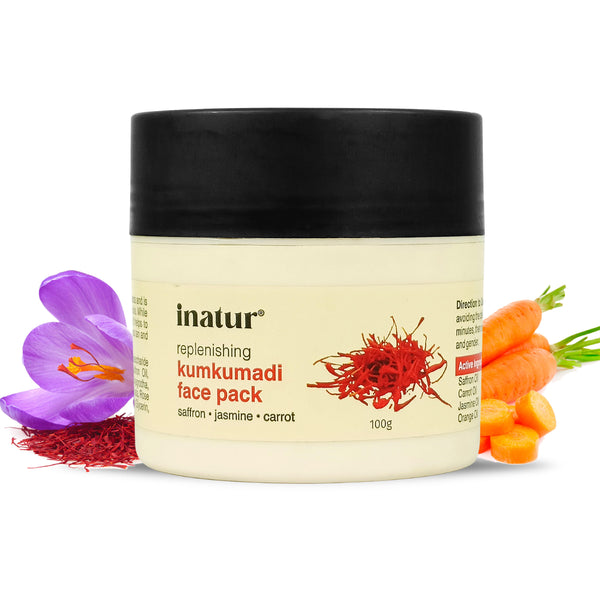 Jar of inatur Kumkumadi face pack with saffron, jasmine, and carrot ingredients on a white background