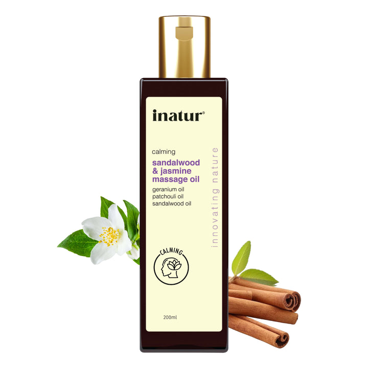 inatur sandsalwood & jasmine massage oil bottle with sandalwood and jasmine elements on a white background