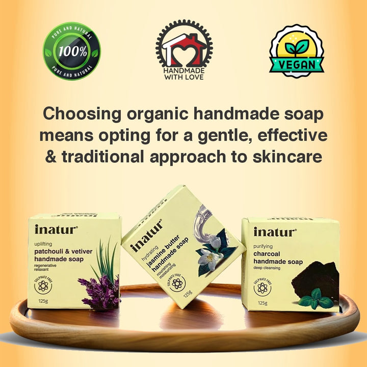 Three boxes of inatur soap on a wooden shelf with text choosing inatur handmade soap means choosing clean beauty and logos of vegan and chemical free